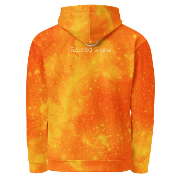 Warm orange and yellow sacred geometry fire galaxy hoodie back with “Sacred Signs” text, hood up, and Shift in Motion energy design.