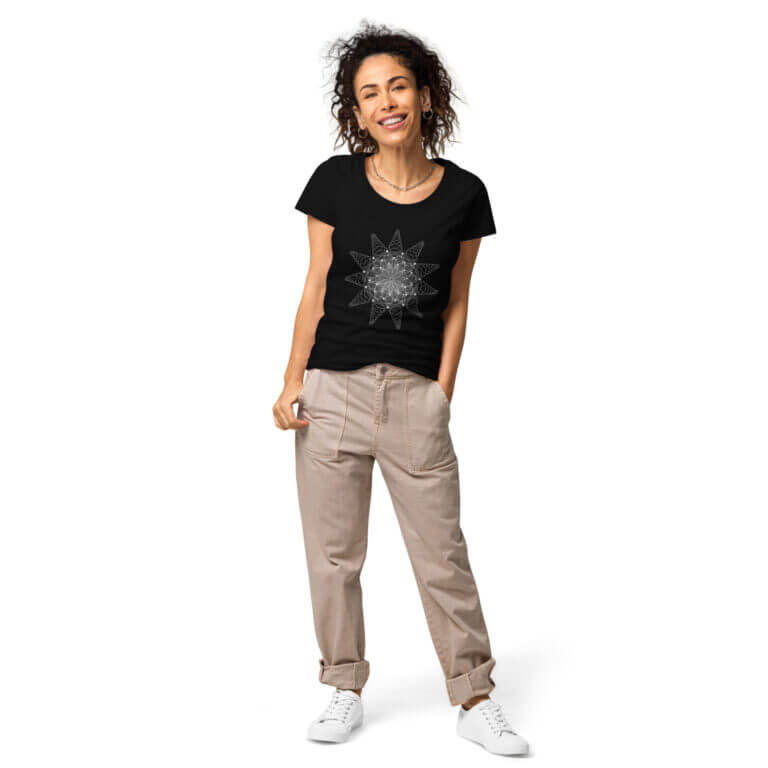 Black t-shirt featuring a white star graphic design, worn by a smiling woman with curly hair, showcasing casual fashion.